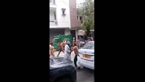 People (hooligans) harassing an elderly while celebrating Ho