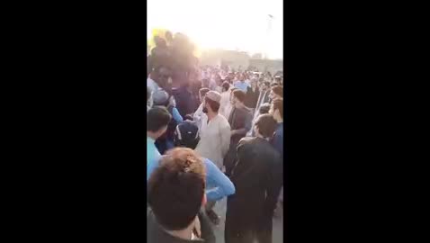 mob harasses street balloon seller